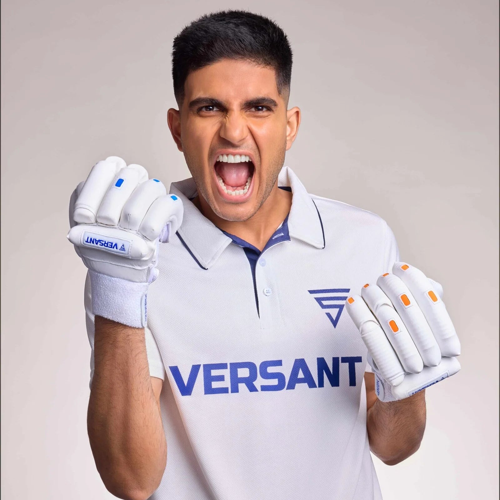 Versant GOAT Cricket Batting Gloves with premium sheepskin leather palm, traditional sausage-finger protection, breathable mesh ventilation, and professional cricket performance.